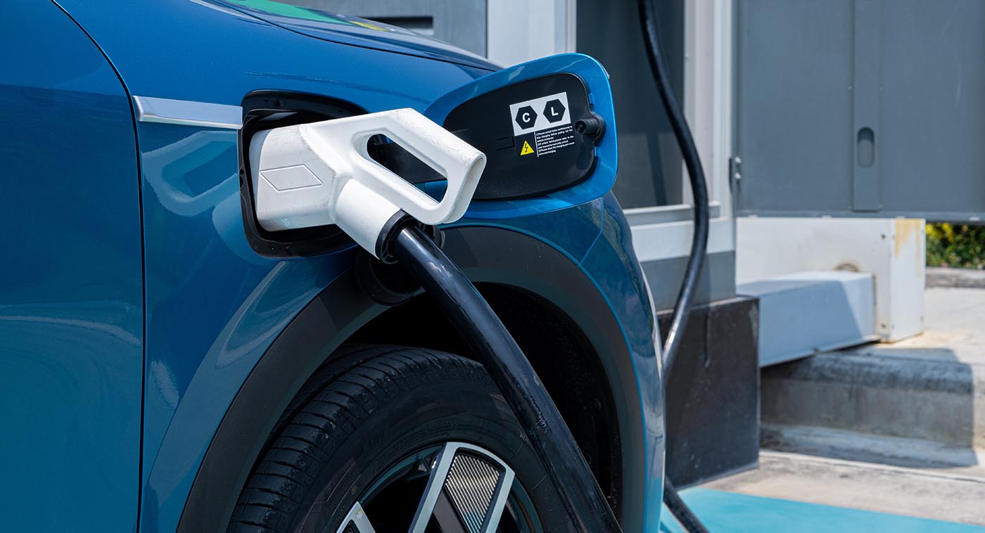 Tesla EV charger installed on a Florida home driveway